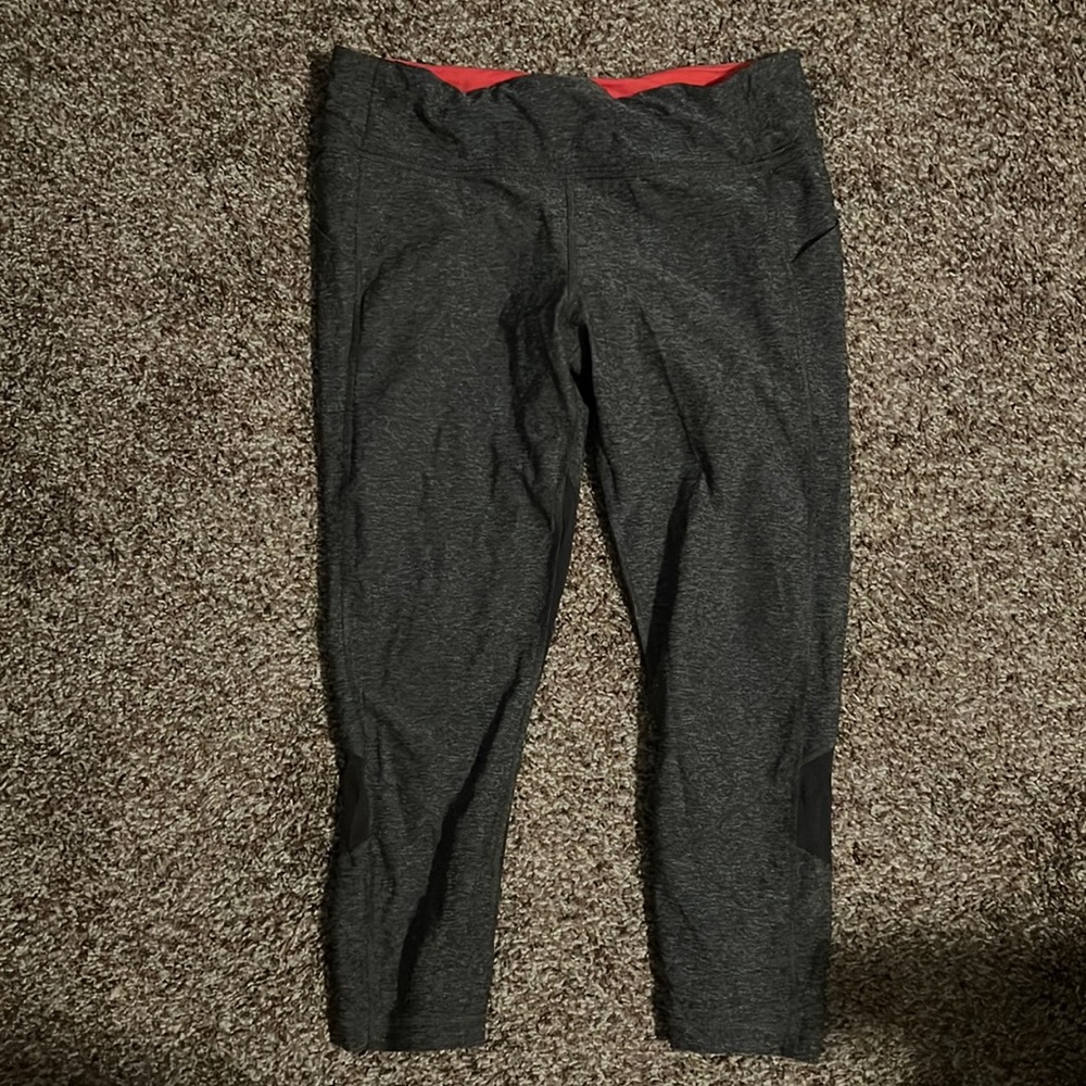 Gray Lululemon leggings, pink band, with side pockets, size 10